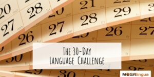 Image of calendar pages with text reading "The 30-Day Language Challenge."