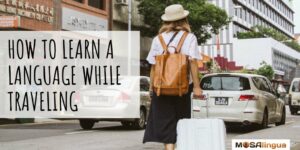 guest post how to learn a language while traveling woman with suitcase and backpack in asian country