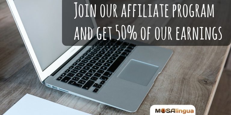 An open laptop on a table with the text: Join our affiliate program and get 50% of our earnings.