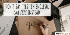 Photo of a hand writing the word "yes" in calligraphy with the text: "Don't say 'yes' in English, say this instead." MosaLingua.