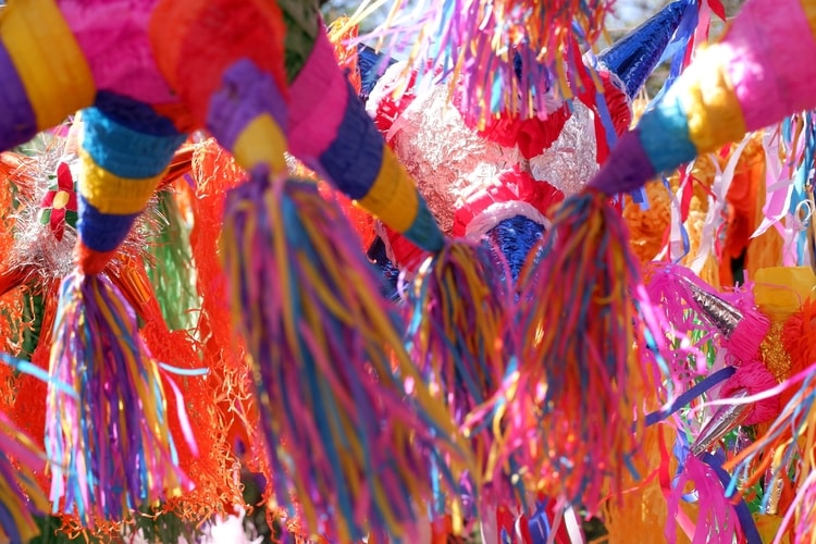 Colorful Mexican Christmas piñatas, one of the many unique Christmas traditions from around the world