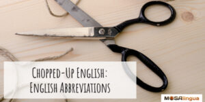 Image of scissors cutting twine. Text reads "Chopped-up English: English Abbreviations."