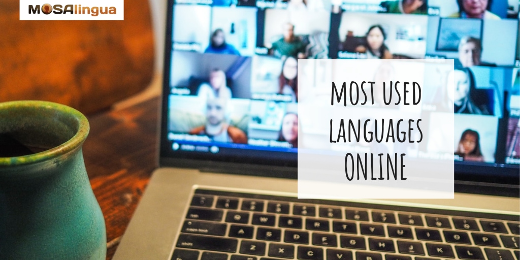A laptop is open to a video conferencing app with many faces on screen. There is a blue mug next to the laptop. Text reads: Most used languages on the internet. MosaLingua.