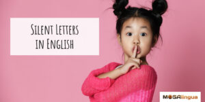 Girl holding her finger to her mouth. Text reads "Silent letters in English."
