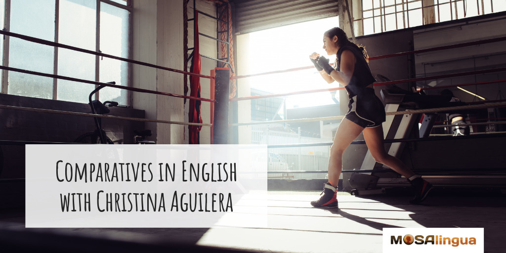 Image of a woman in a boxing ring, text reads "Comparatives in English with Christina Aguilera."