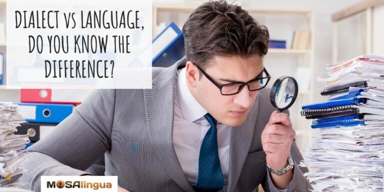 A white man in a business suit and glasses, surrounded by stacks of papers and binders, peering at something on his desk through a magnifying glass. Text reads: Dialect vs language, do you know the difference? MosaLingua