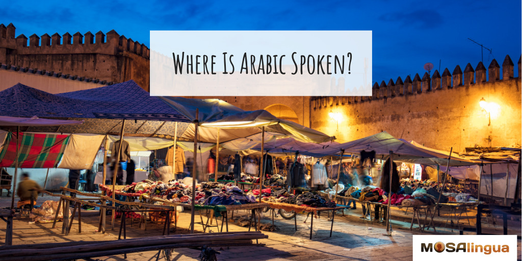 Image of an outdoor marketplace at night. Text reads "Where is Arabic spoken?" Part of Arabic-speaking countries article.