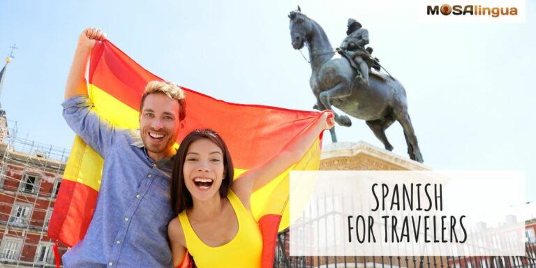 Spanish phrases for travel. Image shows a man and woman holding up the Spanish flag in front of a statue of a person on horseback in a public square in Spain.