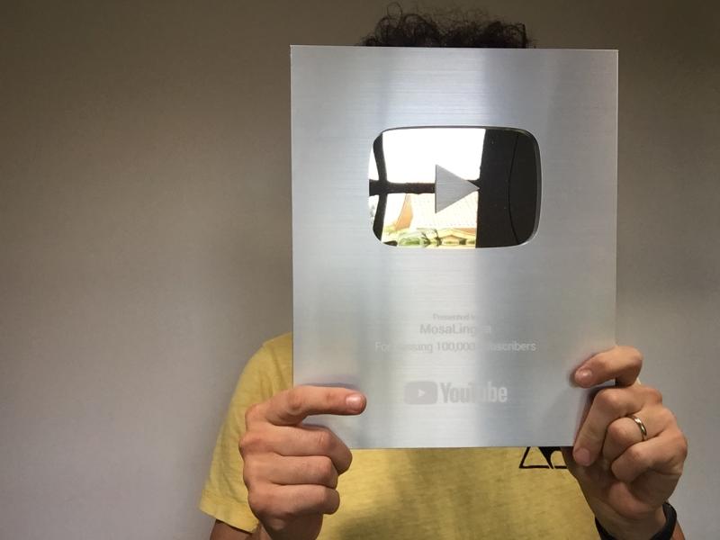 learn a language with youtube 100k subscribers plaque